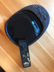 Ink stick and ornate grinding stone.